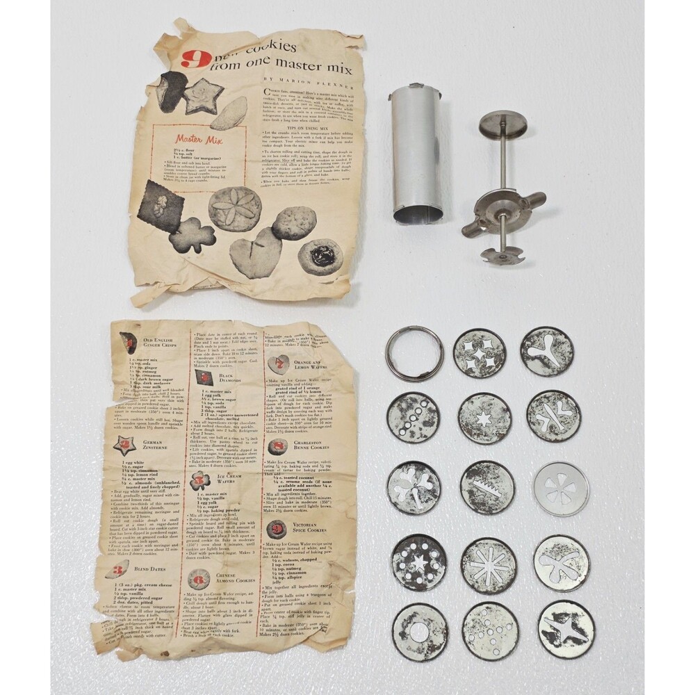 Vintage Aluminum Cookie Press with metal decorating discs and Old Recipes 1950s